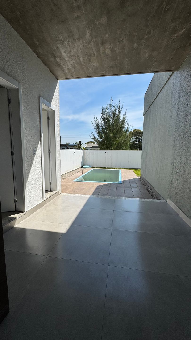 Casa 3 quartos sendo 1 suíte para venda no bairro Balneário Rosa do Mar em Passo de Torres